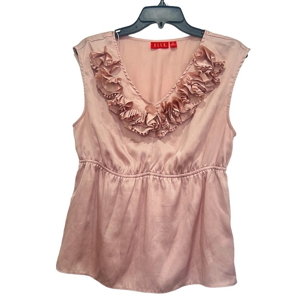 Elle sleeveless V neck swirl flowers details around neck line size M